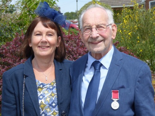 John finds his feet just in time to collect his British Empire Medal