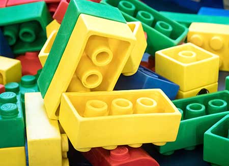 Coloured lego bricks in a small pile